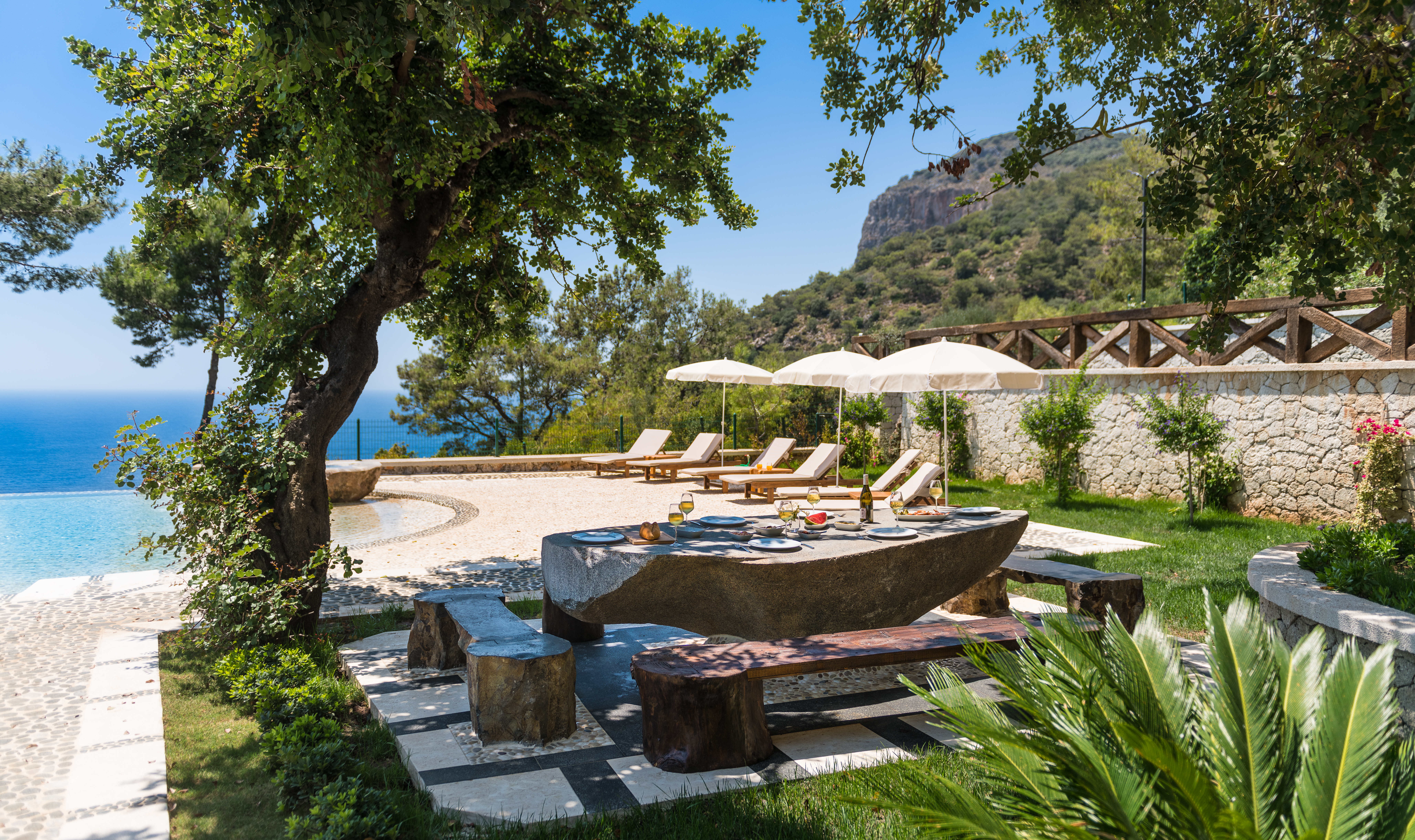 Gokce gemile private chef outdoor stone table lunch