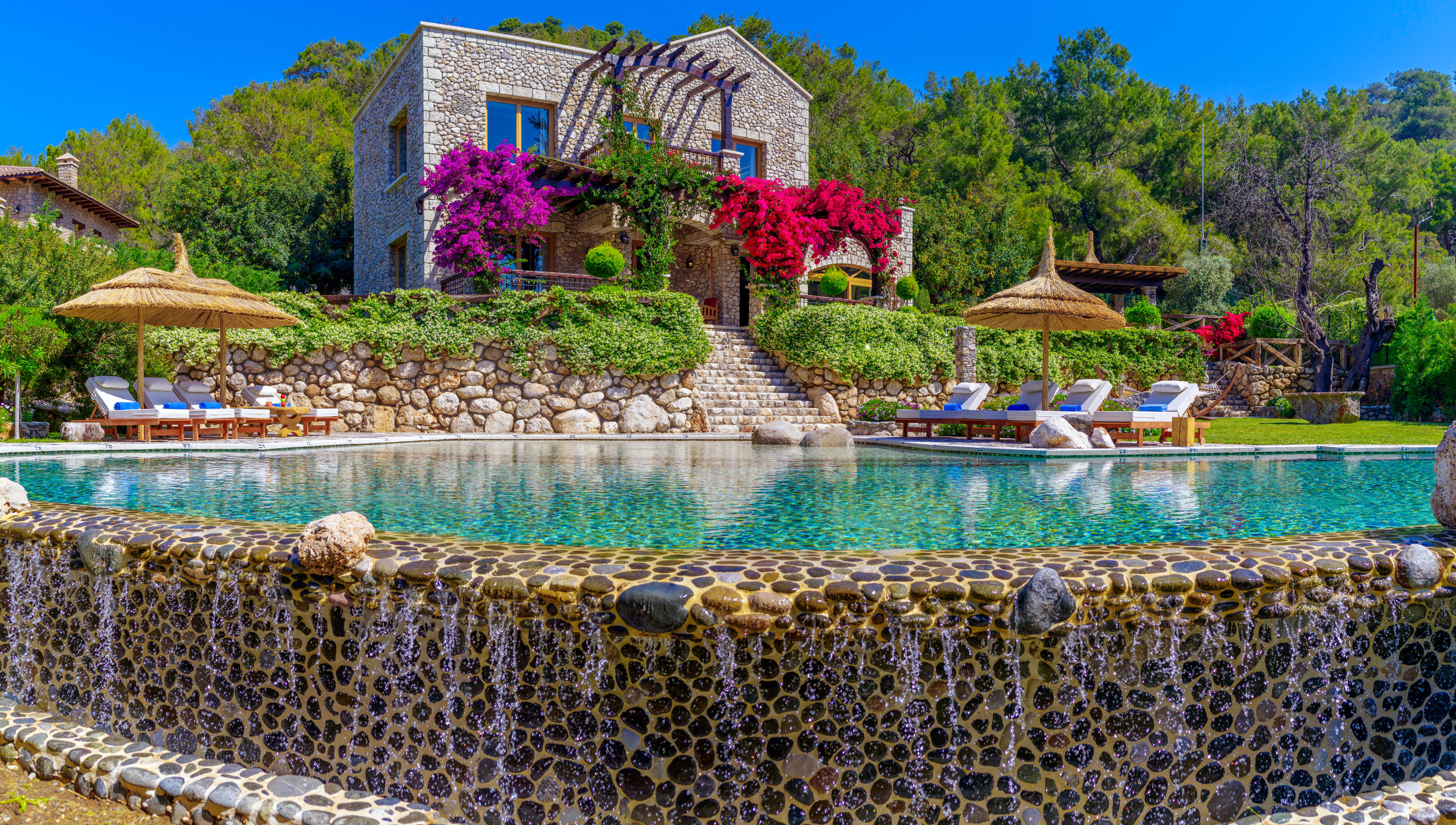 Villa gemile infinity pool stone villa facade
