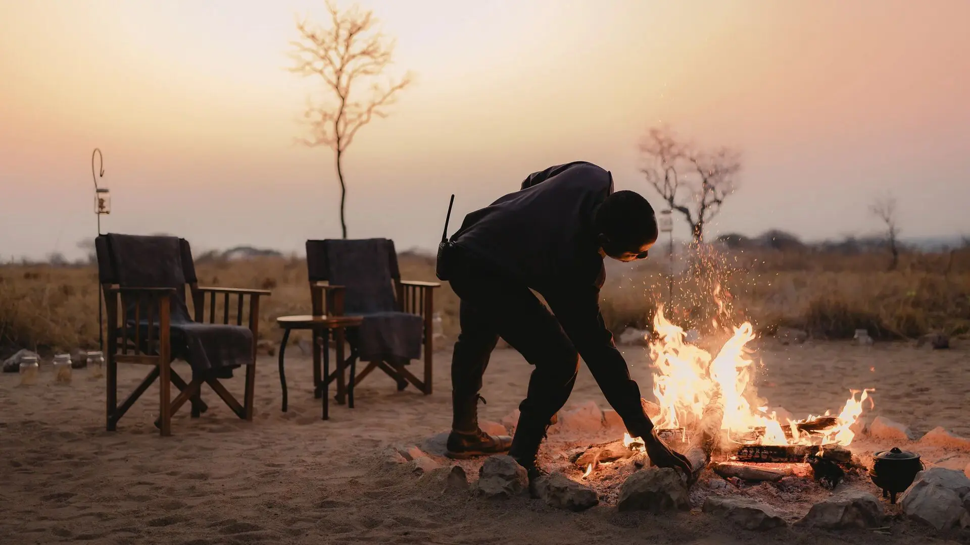 Asilia africa usangu expedition camp campfire jpg
