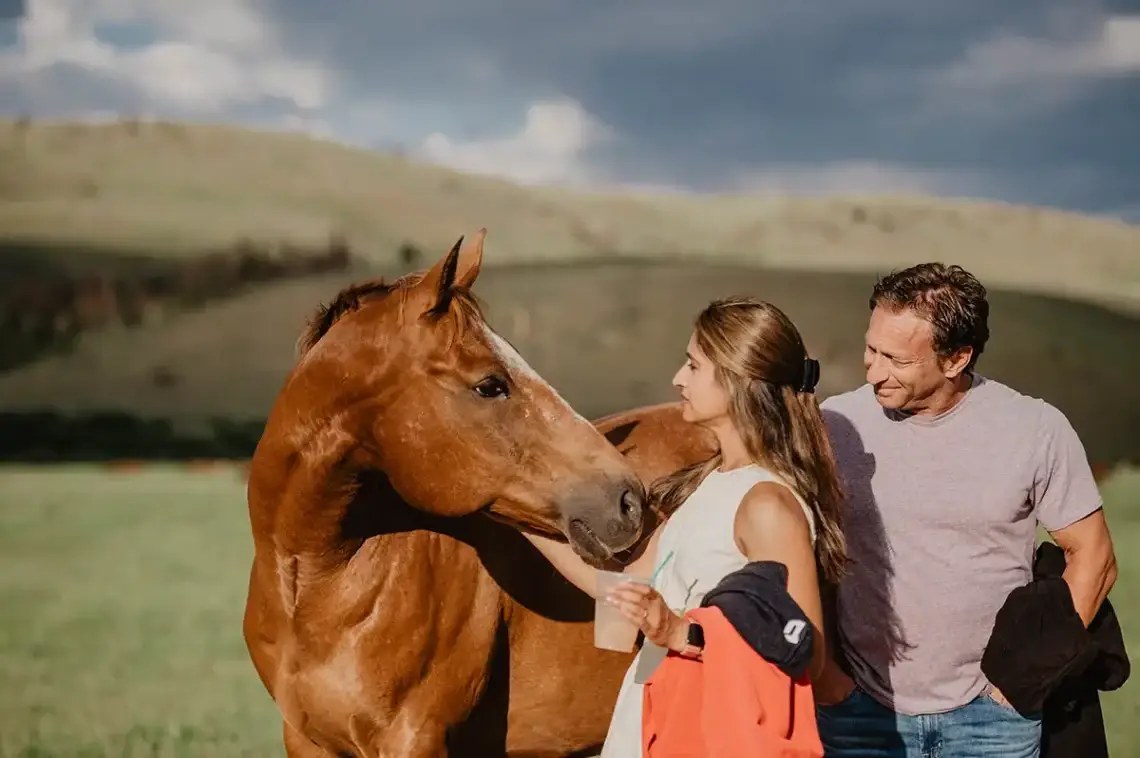 horse smiling at woman 1140x758